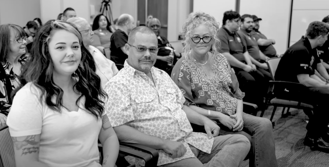 Craig Box and family sitting in room