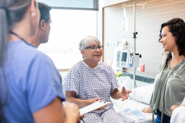 Neurosurgery patients talking with doctors