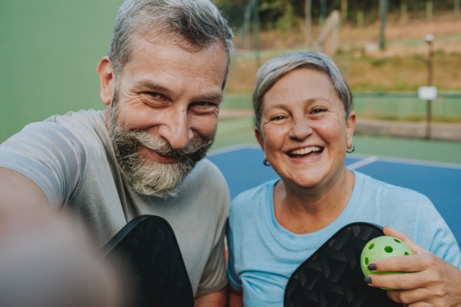 Seniors playing pickleball