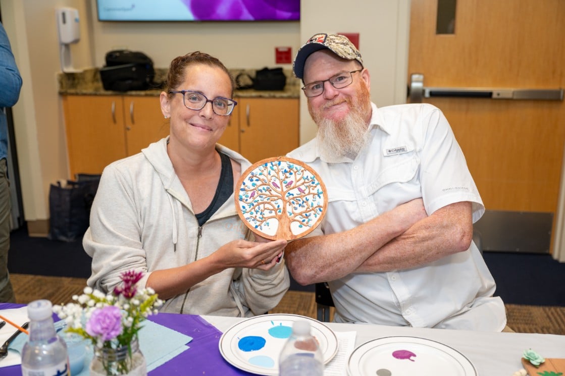 Marie and husband working on art therapy