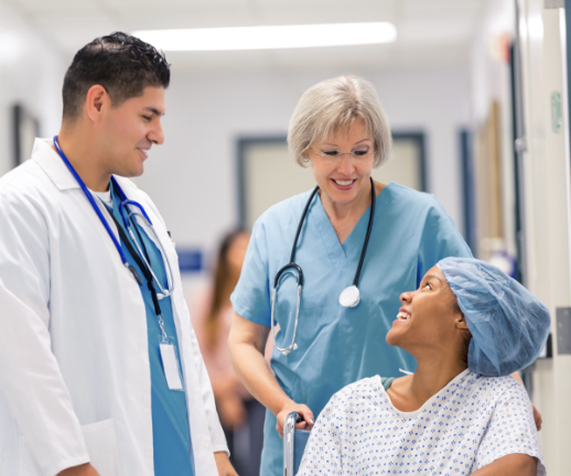 Doctors talking with patient