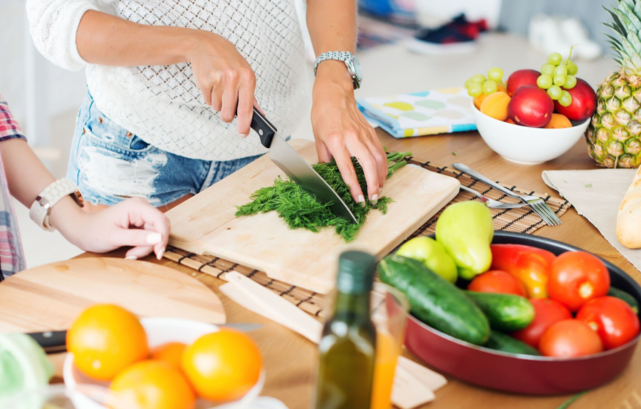 Woman chopping vegetables